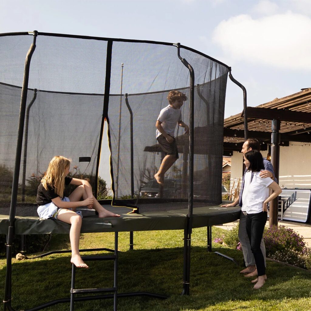 family trampoline enjoying on Above Ground Round Trampoline - supertramp.co.uk