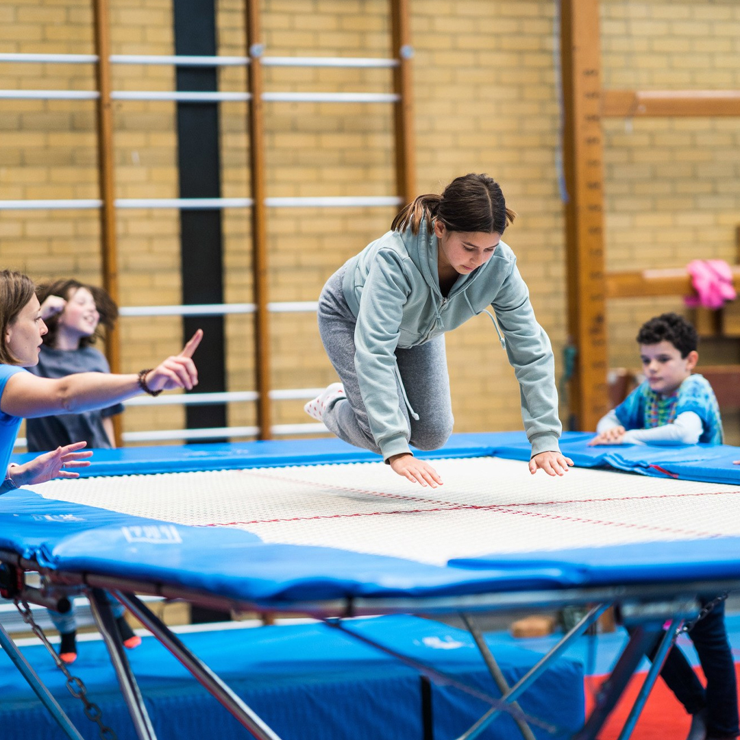 Girl doing practice of jumping n Rectangle Trampoline - Akrobat UK